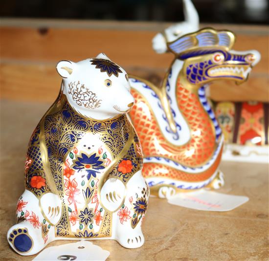 Three Royal Crown Derby paperweights, Llama, Seated Bear and Dragon, all with gold stoppers